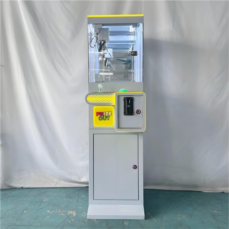 Front view of Lifun Lucky Clamp mini claw machine in grey with joystick, coin acceptor and “Prize Out” door.