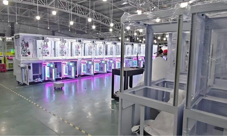 Leyou production line assembling batches of claw machines under bright testing lights