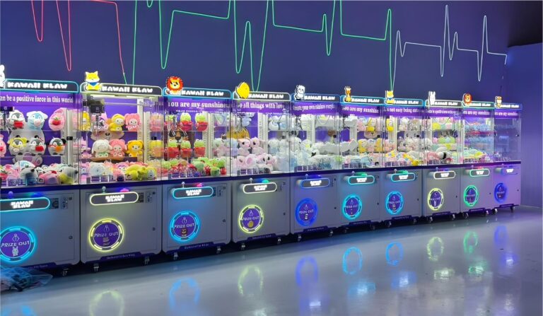 Case 1 — Mall Pop-Up Mini-Arcade: long straight row of claw machines under a neon wall.